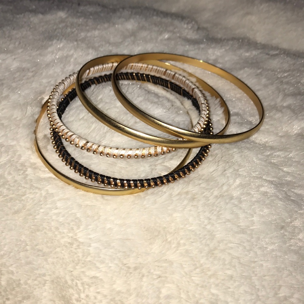Set of Gold, Black and White Bangles